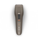 Машинка для стриження Philips Series 5000, акум., роторний мотор, насадок-2, кейс, сталь, коричневий